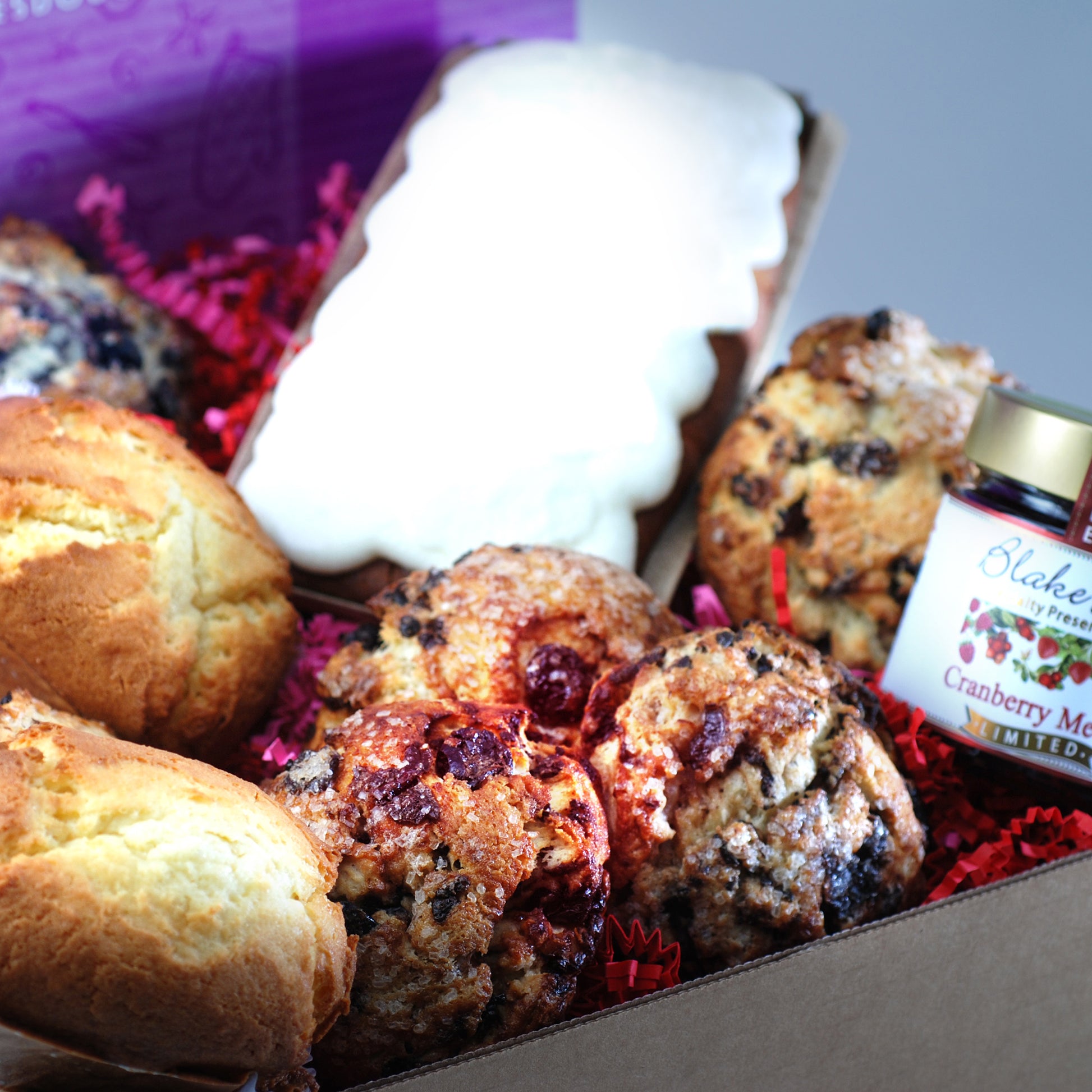 cherry scones, lemon cranberry loaf, berry artisan jam  assortment 