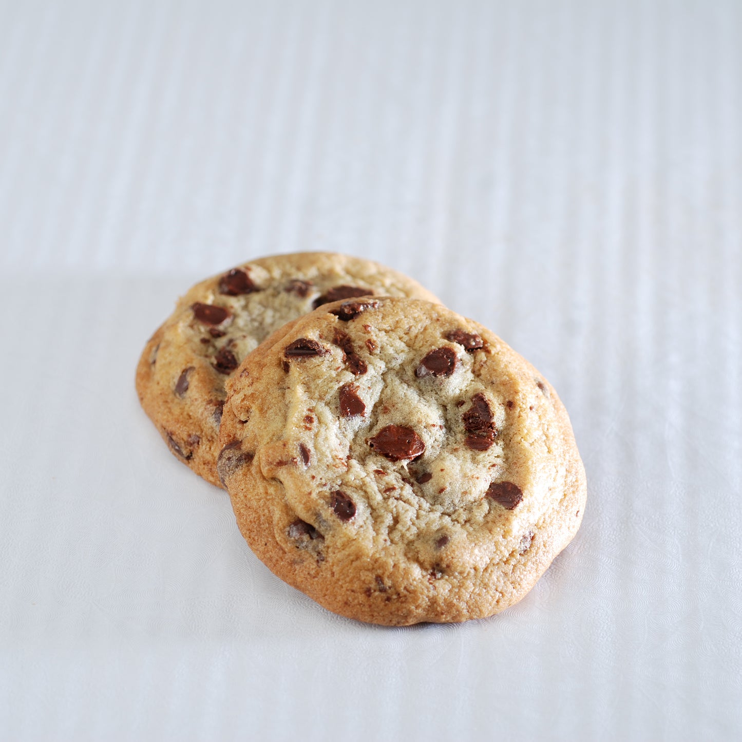 2 individually wrapped chocolate chip cookies